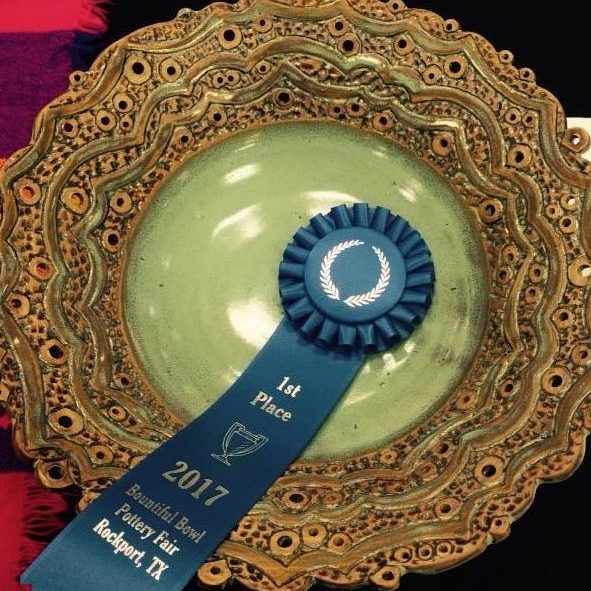 Pottery bowl with 1st place ribbon